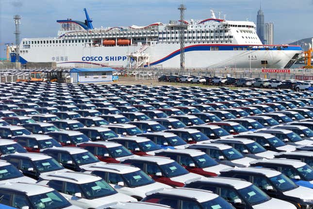 FILE - New cars wait to be transported on a dockyard in Yantai in eastern China&#39;s Shandong province on Aug. 6, 2023. China’s exports and imports both fell in September from a year earlier, though they contracted at a slower pace even as global demand remained muted, according to customs data released Friday, Oct. 23, 2023. (Chinatopix via AP, File)