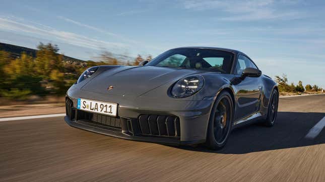 Front 3/4 view of a grey 2025 Porsche 911 Carrera GTS