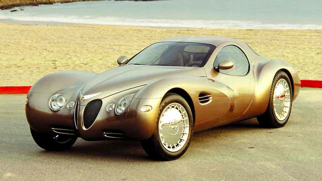 A photo of the Chrysler Atlantic concept car parked on a beach. 