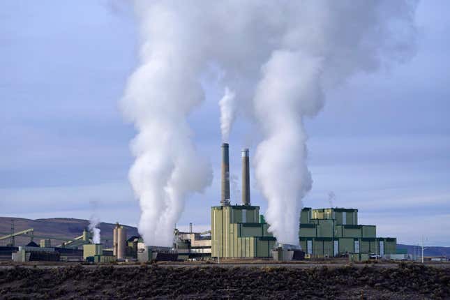 FILE - Steam billows from a coal-fired power plant Nov. 18, 2021, in Craig, Colo. The U.S. Securities and Exchange Commission on Wednesday, March 6, 2024, approved a rule that will require some public companies to report their greenhouse gas emissions and other climate risks. (AP Photo/Rick Bowmer, File)