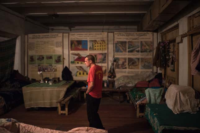 Andrei Dashkosky, 28, is one of the few younger inhabitants of the bunker. His real house is in an area deemed off-limits to civilians. He takes odd jobs landscaping when he can.