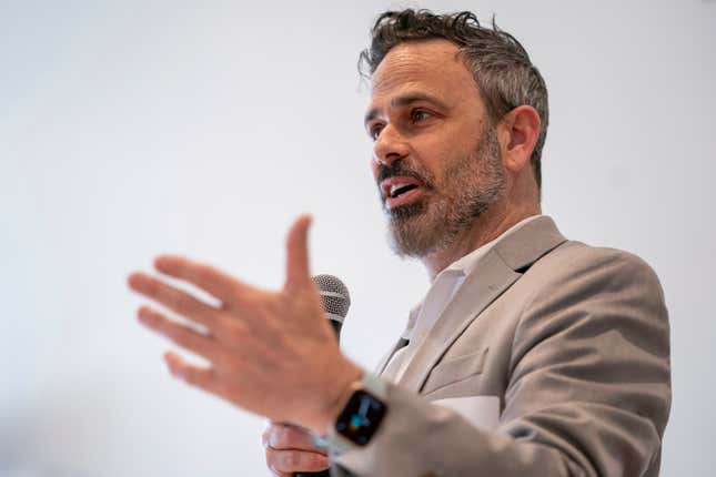 Gabe Klein, executive director of the Joint Office of Energy and Transportation at the U.S. Department of Energy, speaks during a Forth Design and Fund Equitable Electric Transportation For Communities workshop in Washington, Thursday, March 14, 2024. Convincing consumers to go electric, even if they don’t have their own home outlet to plug into, is the mission of the Joint Office of Energy and Transportation. (AP Photo/Nathan Howard)