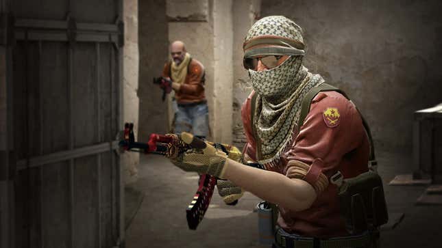 A CS:GO screenshot shows a character wearing a face covering and wielding a machien gun.