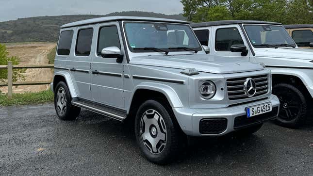 Front 3/4 view of a silver Mercedes-Benz G450d