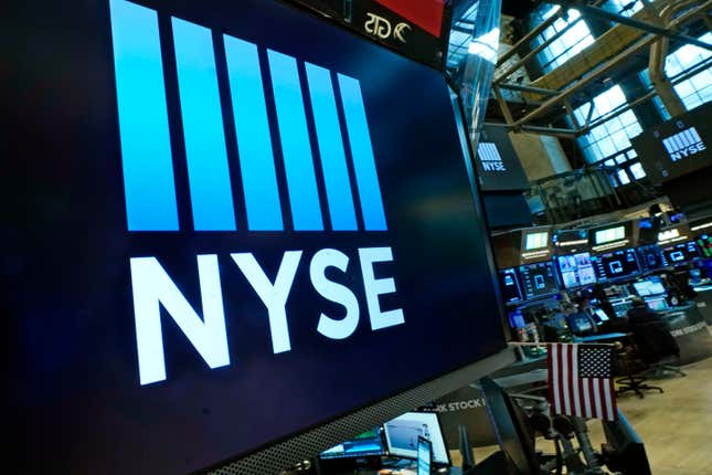 FILE - Logos the New York Stock Exchange adorn trading posts, on the floor, Wednesday, March 16, 2022. Stocks are off to mixed start on Wall Street, Thursday, April 7, as several major technology stocks rose even as many other parts of the market were in the red. (AP Photo/Richard Drew, File)