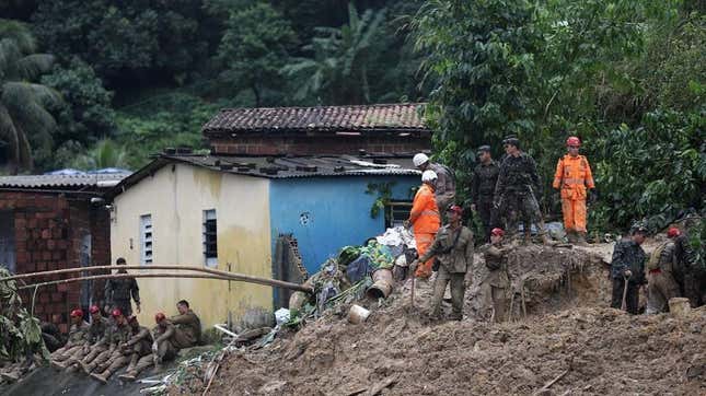 Rescue teams work at the scene of a landslide in Recife, Pernambuco State, in Brazil on May 30 after heavy rain. 