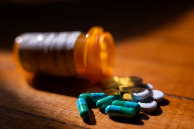 In a photo illustration, prescription drugs are seen next to a pill bottle on July 23, 2024 in New York City. 