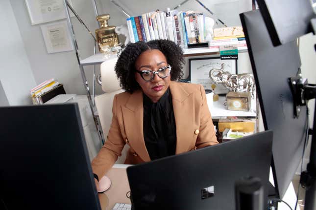 Chantel Adams, a senior marketing executive, sits in her home office Thursday, March 7, 2024, in Durham, N.C. Adams says she isn’t surprised that the gender pay gap persists even among men and women with the same level and quality of education, or that the gap is wider for Black and Hispanic women. (AP Photo/Chris Seward)