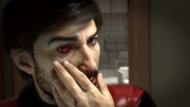 Prey's protagonist looks at his red eye in the mirror.