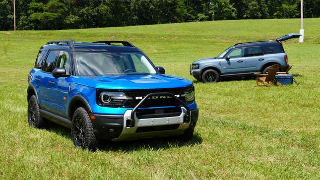 Two 2025 Ford Bronco Sport Sasquatches in a grass field.