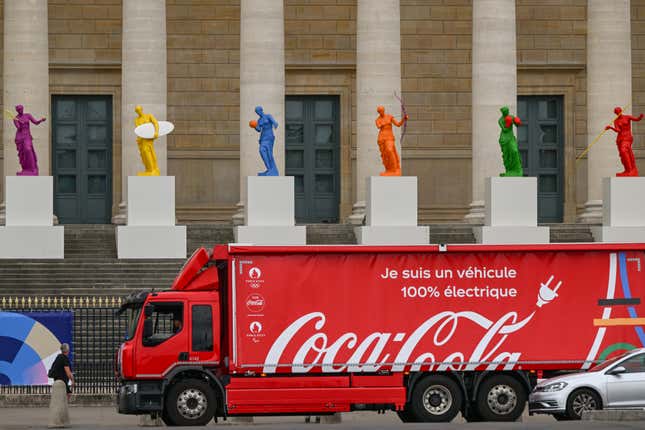 A Coca-Cola truck passes by the National Assembly in Paris, France. 