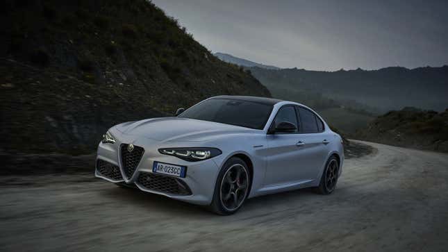 A photo of a silver Alfa Romeo Giulia sedan. 