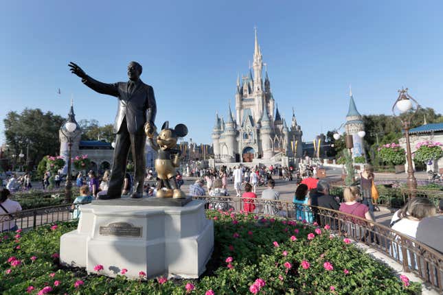 FILE - A statue of Walt Disney and Mickey Mouse appears in front of the Cinderella Castle at the Magic Kingdom theme park at Walt Disney World, Jan. 15, 2020, in Lake Buena Vista, Fla. The earliest version of Disney&#39;s most famous character, Mickey Mouse, and arguably the most iconic character in American pop culture, will become public domain on Jan. 1, 2024. (AP Photo/John Raoux, File)