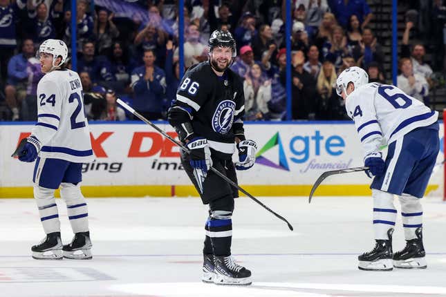 TAMPA, FL - APRIL 17: Nikita Kucherov #86 of the Tampa Bay Lightning celebrates his 100th assist on the season as Connor Dewar #24 and David Kampf #64 of the Toronto Maple Leafs react during the second period at the Amalie Arena on April 17, 2024 in Tampa, Florida. (Photo by Mike Carlson/Getty Images)