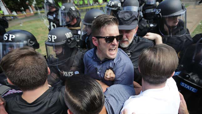 White supremacist Richard Sspencer, seen here as he and his supporters fight with Virginia State Police in Charlottesville, Virginia's Emancipaton Park after Unite the Right was declared an unlawful gathering on Aug. 12, 2017.