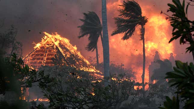 The hall of historic Waiola Church in Lahaina and nearby Lahaina Hongwanji Mission are engulfed in flames along Wainee Street, Tuesday, Aug. 8, 2023, in Lahaina, Hawaii. 