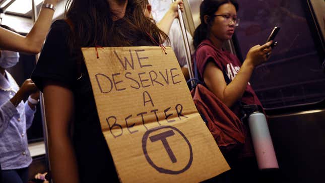 A photo of a sign saying "We deserve a better T."