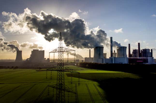 FILE - Steam rises from the coal-fired power plant Neurath near Grevenbroich, Germany, on Nov. 2, 2022. A flagship EU law intended to push European companies toward net zero faces being seriously weakened by member states, a confidential document passed to The Associated Press reveals, with firms seemingly no longer forced to implement Paris Agreement goals. (AP Photo/Michael Probst, File)