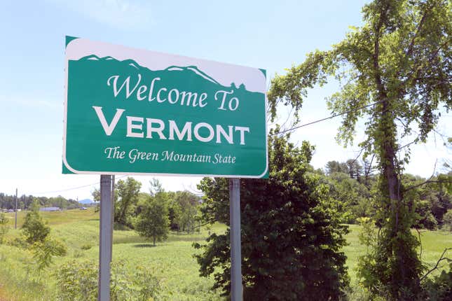 A “Welcome to Vermont” sign at the state line.