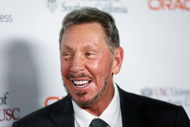 close up of Larry Ellison looking to his right and laughing