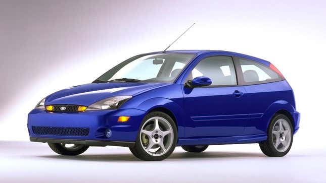 A photo of a blue Ford Focus hatchback. 