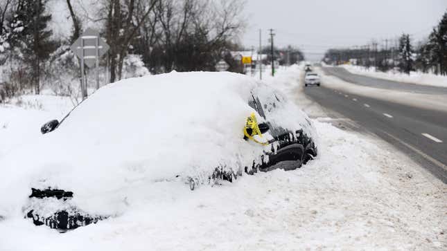 WEST SENECA, NY - DECEMBER 26: A car is abandoned along Southwestern Boulevard on December 26, 2022 in West Seneca, New York. 