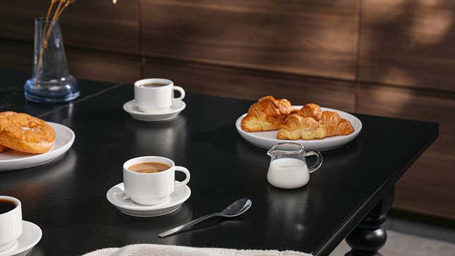 Sweese Porcelain Stackable Espresso Cups with Saucers and Metal Stand | $21 | 22% Off | Amazon