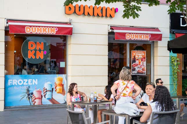 Customers at a Dunkin’ Donuts in Spain.