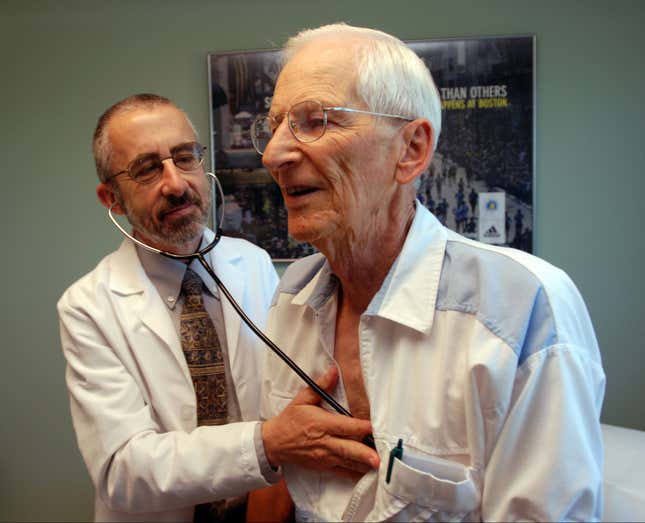 doctor examines patient cliff