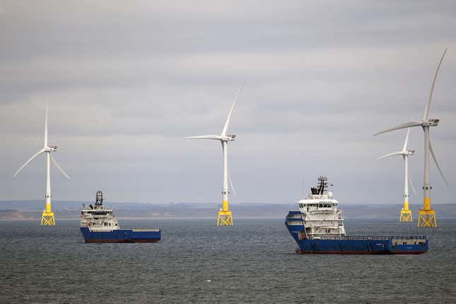 Floating wind turbines and two boats
