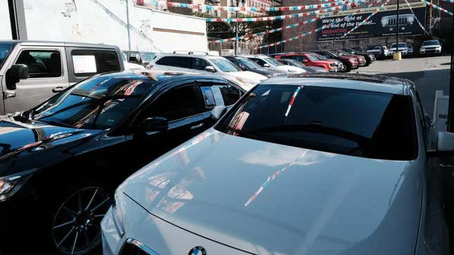 Used cars parked in a sales lot. 