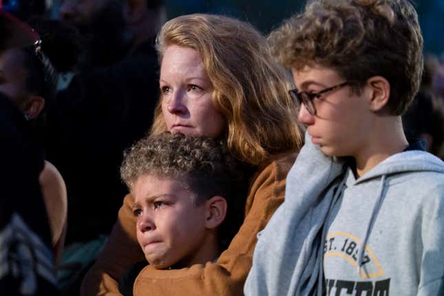 People become emotional while attending a vigil in memory of Pava LaPere, founder of tech startup EcoMap Technologies, on Wednesday, Sept. 27, 2023, in Baltimore, to memorialize the 26-year-old who was found dead in an apartment building Monday. Loved ones and friends are remembering the slain Baltimore tech entrepreneur for her compassion and dedication to helping others. Baltimore police found 26-year-old Pava LaPere dead from blunt force trauma in her apartment complex after she was reported missing late Monday morning. (AP Photo/Stephanie Scarbrough)