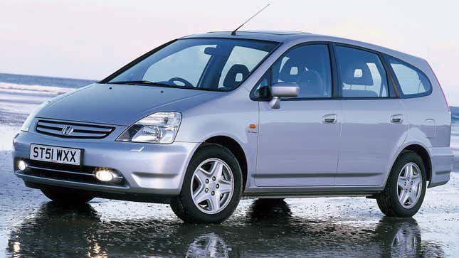 A photo of a silver Honda Stream minivan. 