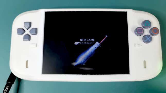 Modder YveltalGriffin's "Hanami," a retro PlayStation One transformed into a handheld console, lies flat on a tealish surface with the Final Fantasy 7 start menu on the screen.