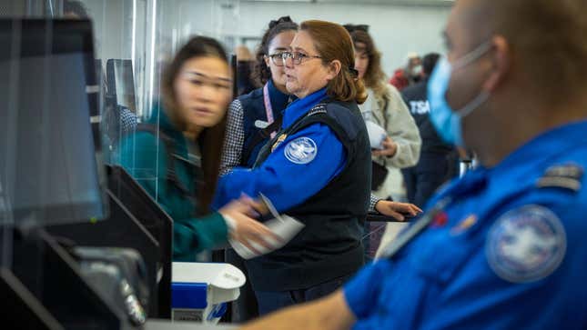 Passengers go through security check by TSA at Los Angeles International Airport on Wednesday, Jan. 10, 2024 in Los Angeles, CA.