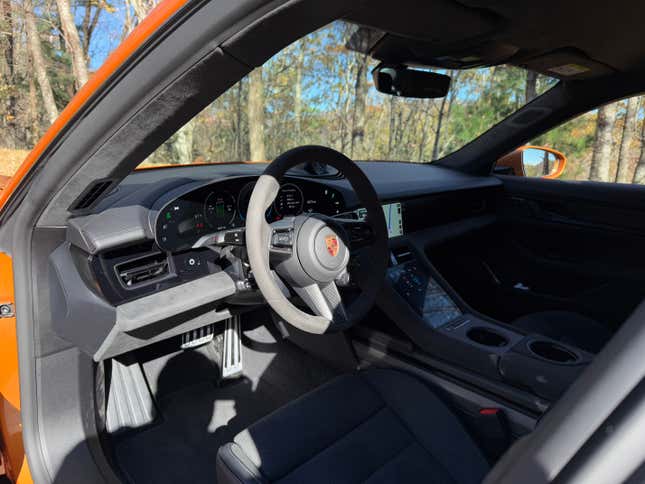 Dashboard of a Nordic Gold 2025 Porsche Taycan GTS sedan