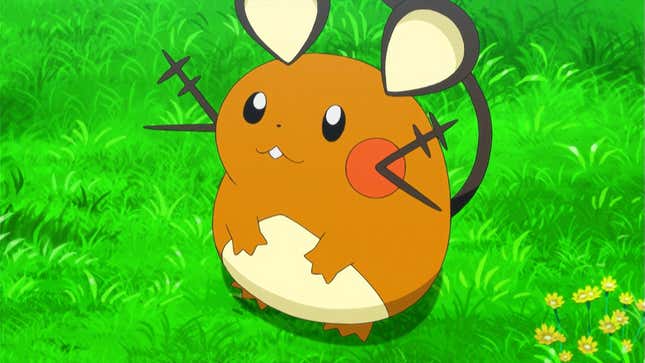 Dedenne is shown standing in a grassy field.