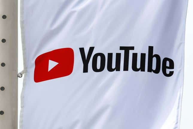 close up of YouTube logo on a white flag