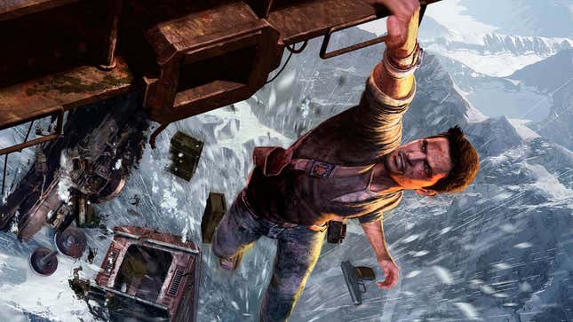 An image shows Nathan Drake dangling from a train with one hand. 