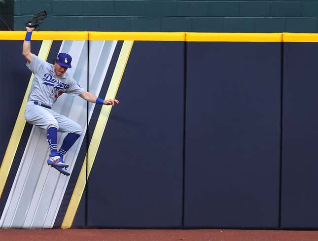 Image for article titled Cody Bellinger’s Spectacular Catch Steals Home Run Ball From Fan Holding On By A Thread