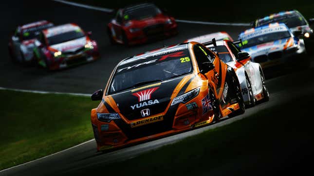 A photo of a Honda Civic racing at Brands Hatch. 