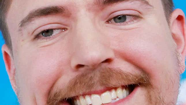 A close up image of MrBeast's smiling face. 