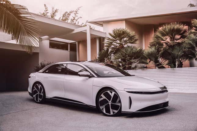 A front three-quarters view of a white Lucid Air EV