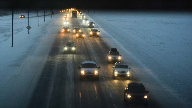 A photo of a snow-covered highway in Canada. 