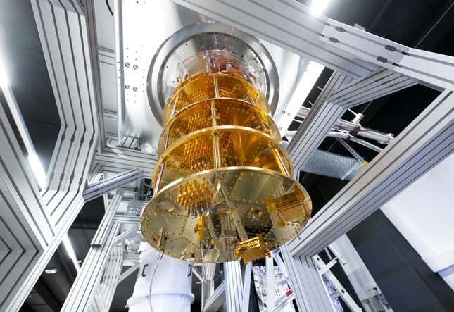 a golden quantum computer suspended from the ceiling