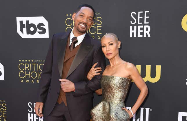 Jada Pinkett Smith and actor Will Smith arrive for the 27th Annual Critics Choice Awards at the Fairmont Century Plaza hotel in Los Angeles, March 13, 2022. (Photo by Valerie MACON / AFP) (Photo by VALERIE MACON/AFP via Getty Images)image caption