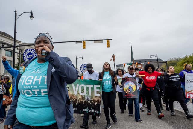 MONTGOMERY, ALABAMA - MARCH 11: People march towards the Alabama State Capitol on March 11, 2022 in Montgomery, Alabama. Community residents, organizers, and activists concluded the 11 day Selma-to-Montgomery march today with a rally at the Alabama State Capitol.