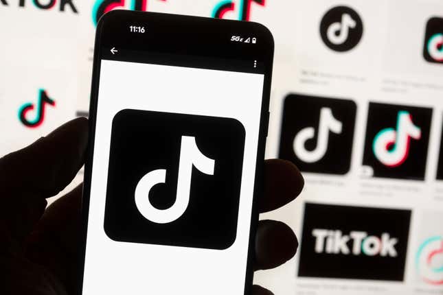 FILE - The TikTok logo is displayed on a mobile phone in front of a computer screen, Oct. 14, 2022, in Boston. A measure set to force TikTok&#39;s parent company to sell the video-sharing platform or face a ban in the U.S. received President Joe Biden&#39;s official sign-off on Wednesday, April 24, 2024. But the newly-minted law could soon face an uphill battle in court. (AP Photo/Michael Dwyer, File)