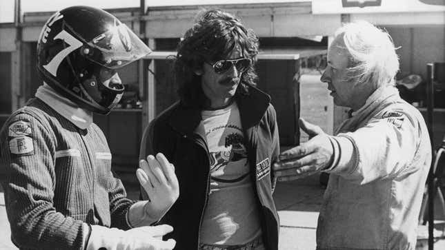 A photo of George Harrison at a race track. 