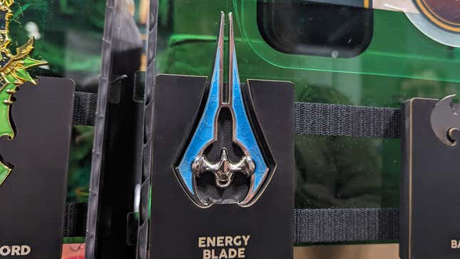A bottle opener shaped like an energy sword from Halo sits on display.